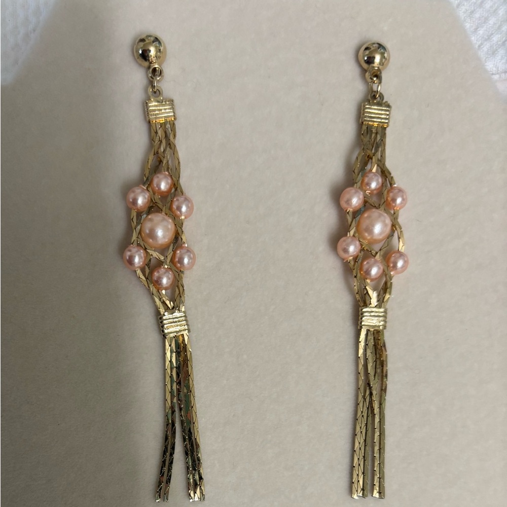 Gold tone dangle earrings